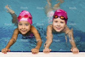stock-photo-50466308-two-little-girls-in-swimming-pool